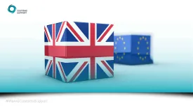 two cubes, one decorated with a UK flag, one with an EU flag.